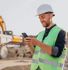 Male worker with bulldozer in sand quarry
